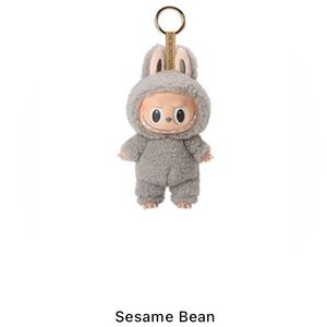 Exciting Macaron Sesame Bean Plush Pendant. Newer version comes in dust bag